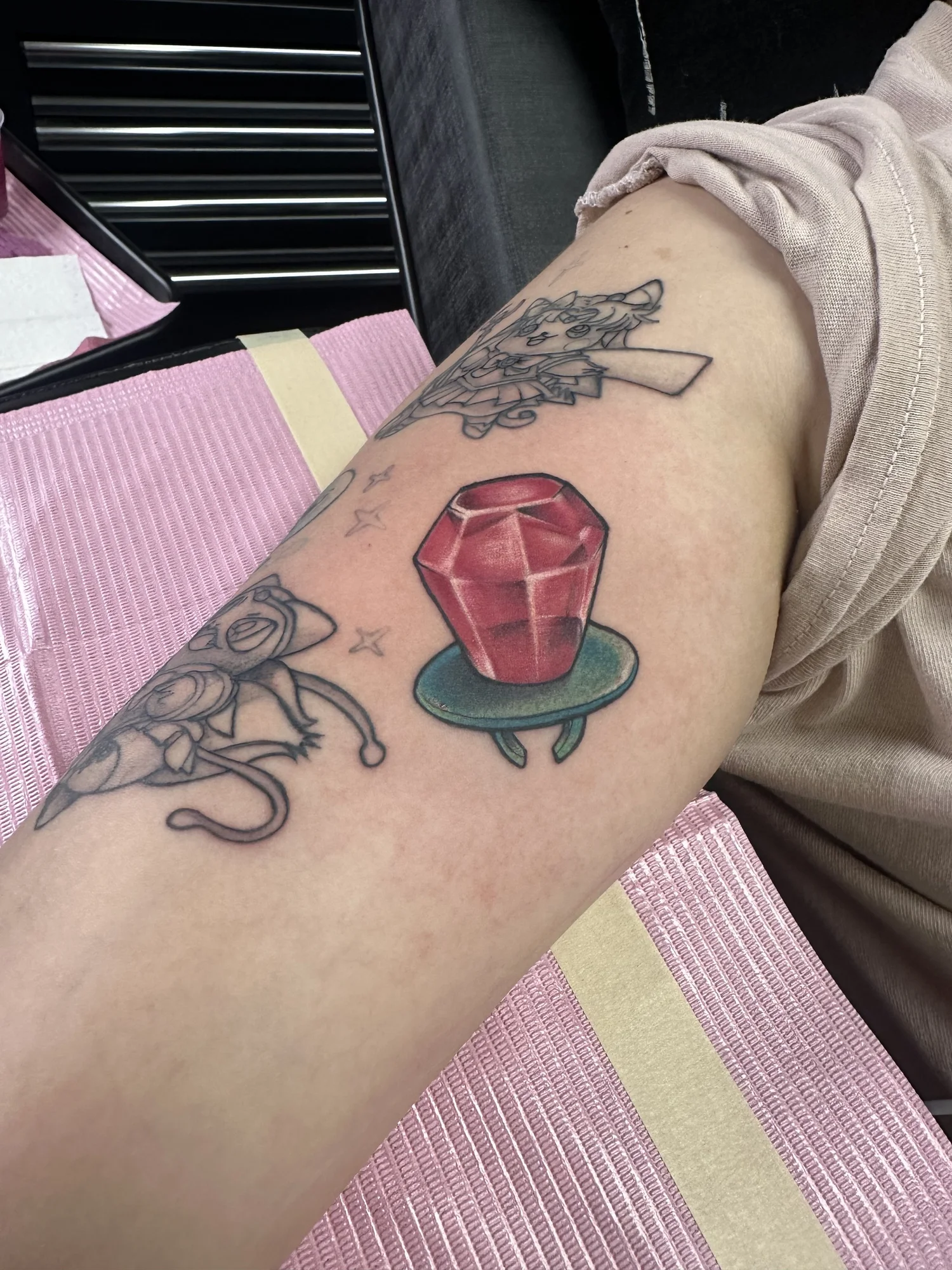 Red key sword tattoo