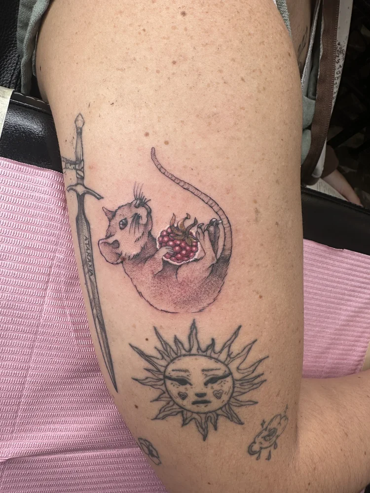 Rat with pomegranate