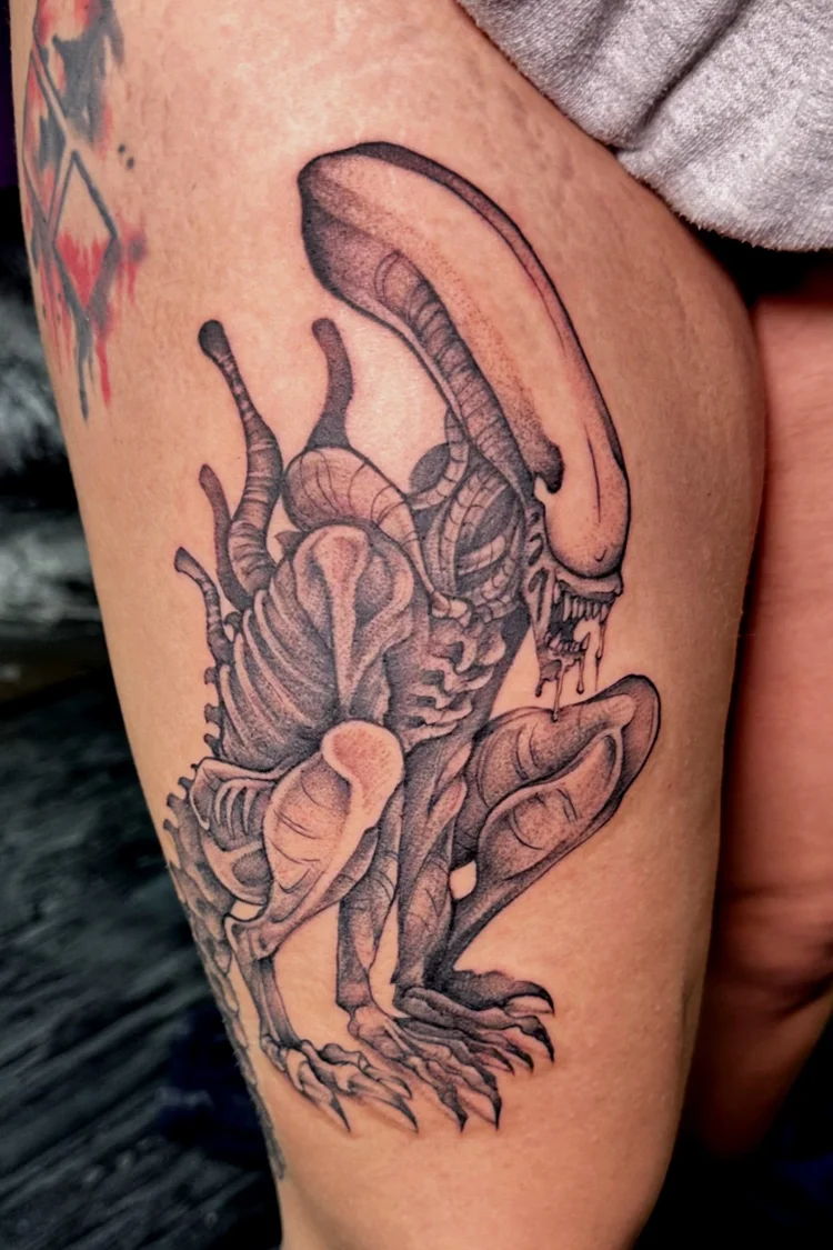 Black and gray Xenomorph tattoo