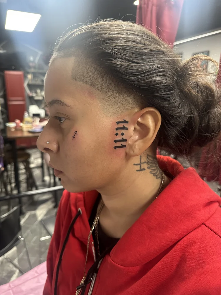 11:11 face tattoos