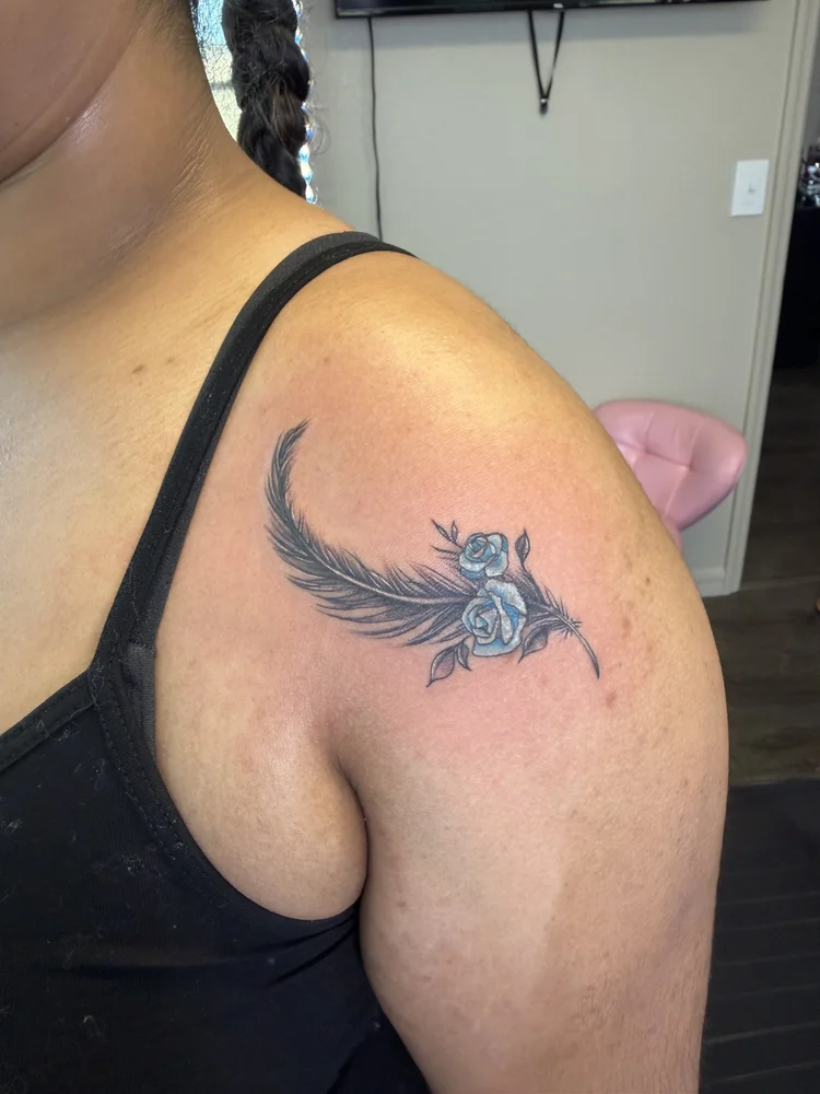 Blue rose feather color tattoo
